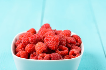 White Bowl Of Red Fresh Raspberries