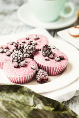 raw vegan berry cheesecake with coconut, close-up