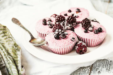 raw vegan berry cheesecake with coconut, portioned