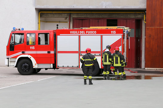 vehicle carrying firefighters and equipment for fighting fire