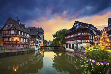 Strasbourg. Image of Strasbourg old town during dramatic sunset. - obrazy, fototapety, plakaty