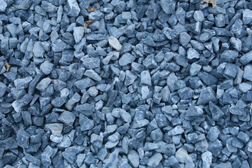 macro texture isolated crushed gray stone in natural lighting