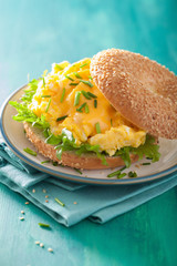 breakfast sandwich on bagel with egg cheese lettuce