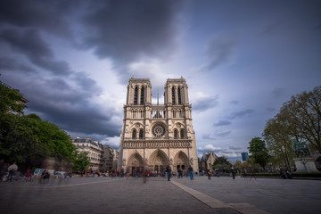 Fototapeta na wymiar Notre Dame de Paris. France. Ancient catholic cathedral on the quay of a river Seine. Famous touristic architecture landmark in spring