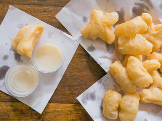 deep fried dough stick with milk in breakfast