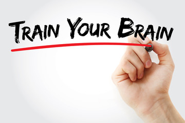 Hand writing Train Your Brain with marker, concept background