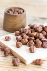 Pile of hazelnuts on the rustic table boards