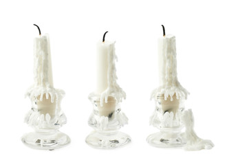 Burnt candle in candlestick isolated