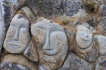 human face smile on stone cave
