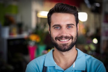 Fototapeta premium Portrait of male florist smiling