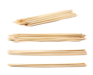 Pile of wooden skewers isolated