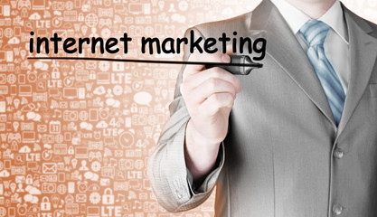 business man writing internet marketing