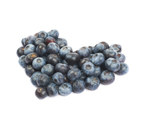 Heart shape made of bilberries isolated