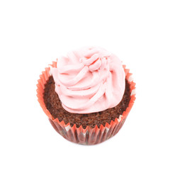 Chocolate muffin with pink cream isolated
