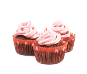 Chocolate muffin with pink cream isolated