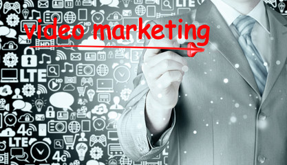 business man writing Video Marketing