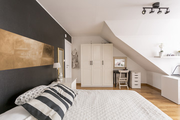 Attic bedroom in black and white - obrazy, fototapety, plakaty