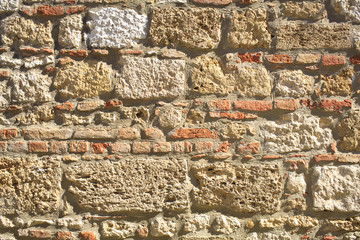 ancient wall background, sandstone and bricks