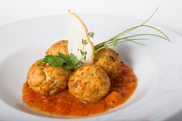 Meatballs on a whita plate