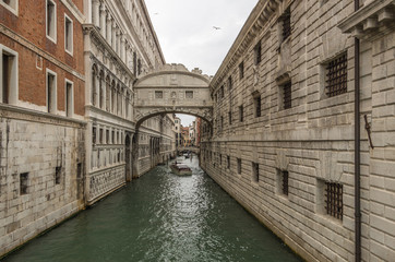 Obraz premium The Bridge of Sighs sits across the Canals and Waterways of famous Venice