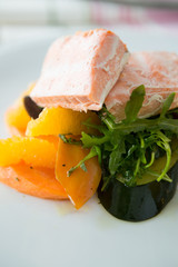 Salmon steak with vegetables