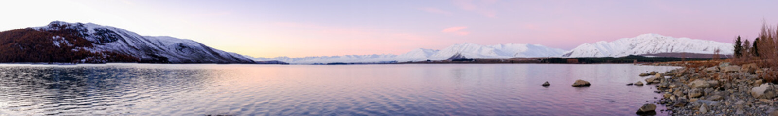 A panorama photo of sunset at Lake Tekapo, New Zealand