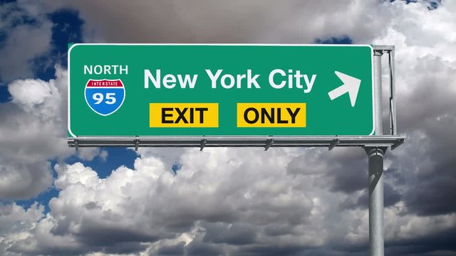 New York City Interstate 95 exit only sign with time lapse clouds.