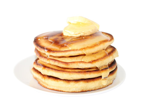 Pancakes with liquid honey (image with clipping path)