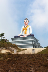 Statue of sitting Buddha in Cambodia, Bokor Mountains