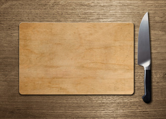 cutting board on wood table
