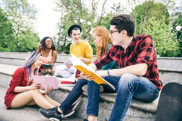 Students doing homeworks outdoors