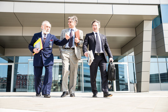 Businessmen Walking Outdoors