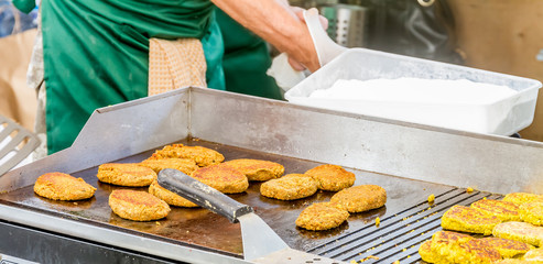 chef preparing a gourmet burger