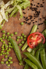 Vegetables and pasta on wood background. Bio Healthy food, herbs and spices. Organic vegetables