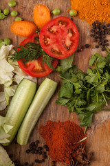 Vegetables and pasta on wood background. Bio Healthy food, herbs and spices. Organic vegetables