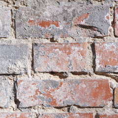 Fragment of an old brick wall