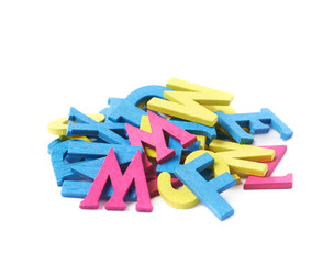 Pile of painted wooden letters isolated