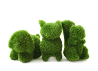 Green toy animals isolated