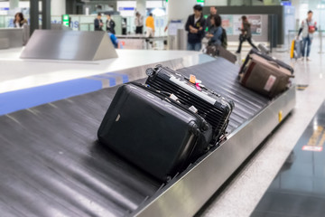 Luggage on the track blur background in airport