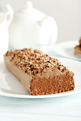 Chocolate cake on a blue wooden background