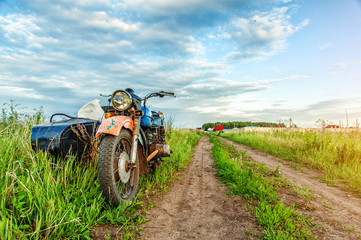 Fototapeta na wymiar Retro motorcycle trailer on country road