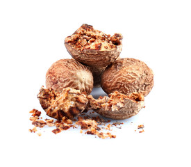 Crushed nutmeg isolated on white