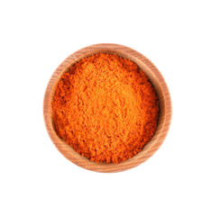 Powdered paprika in small wooden bowl isolated on white