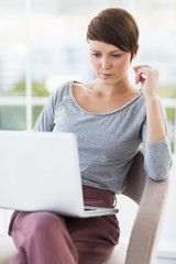 Young woman using laptop