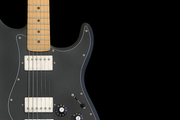 Electric guitar body isolated on black background.
