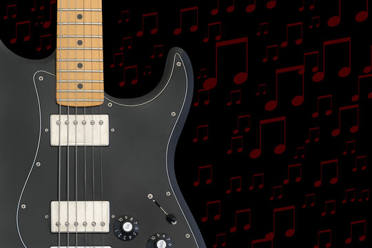 Electric guitar body with black background and notes.