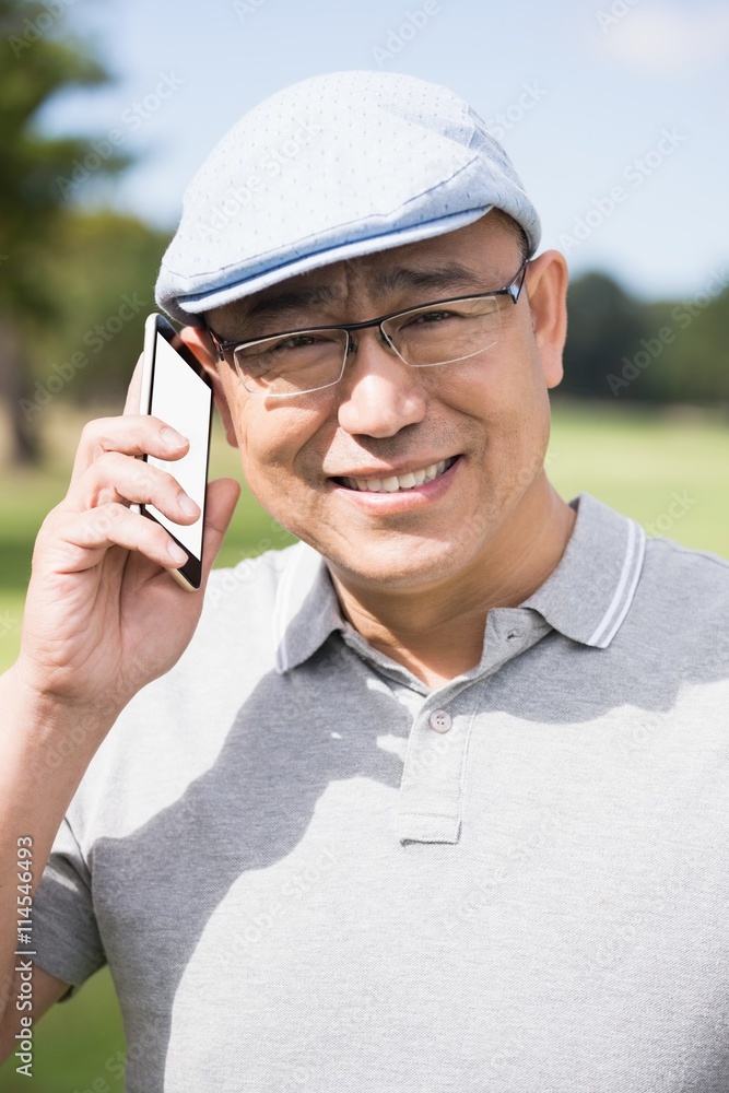 Poster Portrait of golfer smiling and calling