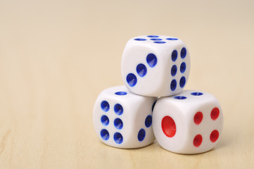 Dices on Wooden Background, Selective Focus