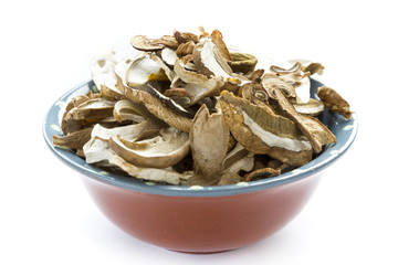 Dried boletus mushrooms in bowl
