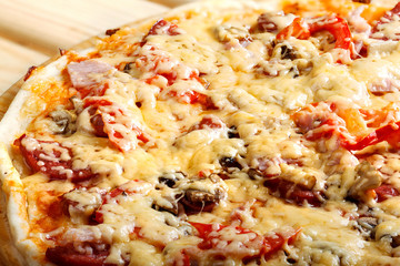 Delicious italian pizzas served on wooden table